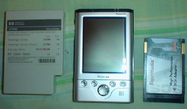 E740 size compared to a DeskJet font cartridge and PCMCIA card