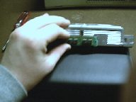 SIMM aligned with CD-ROM drive screw hole